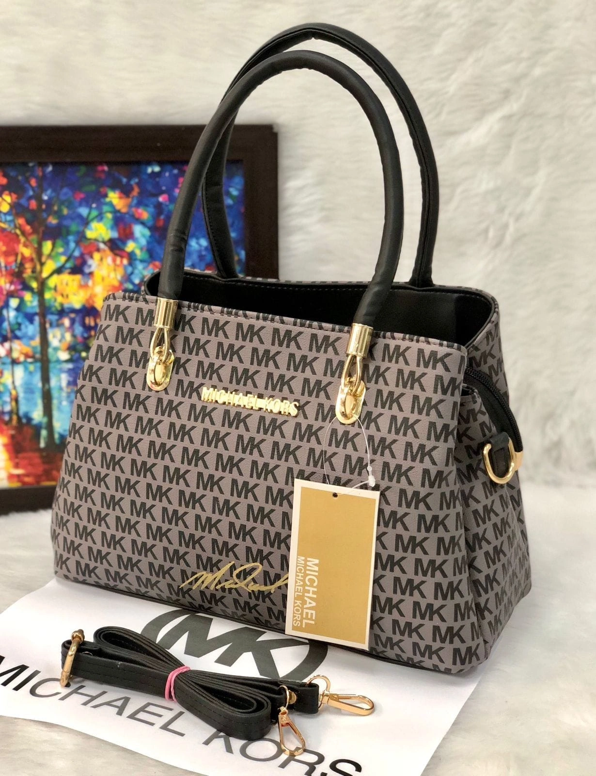 women's handbag with a stylish monogram design for a fashionable everyday look.