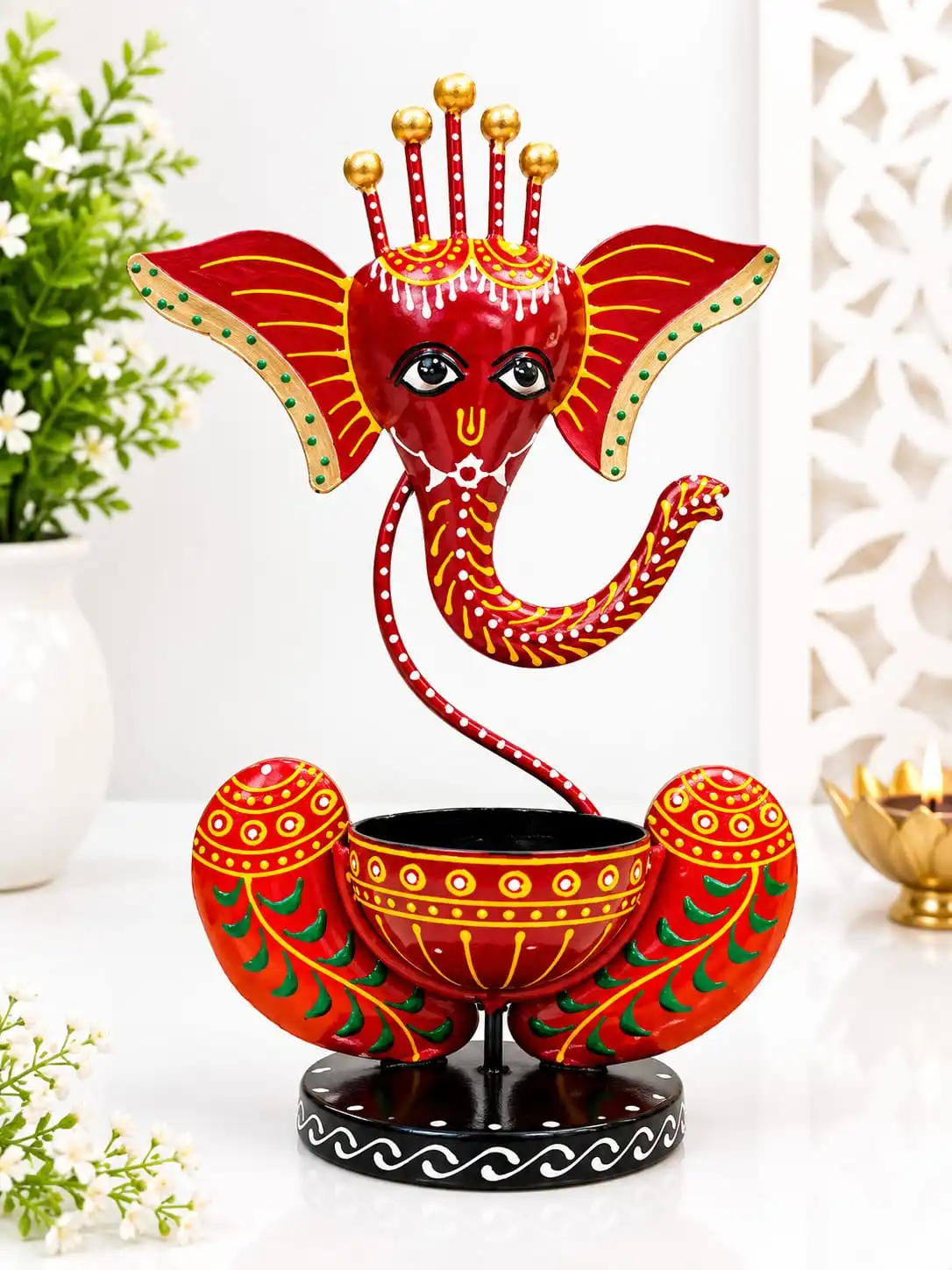 Handcrafted Ganesha-Inspired Decorative Showpiece with a unique artistic design.
