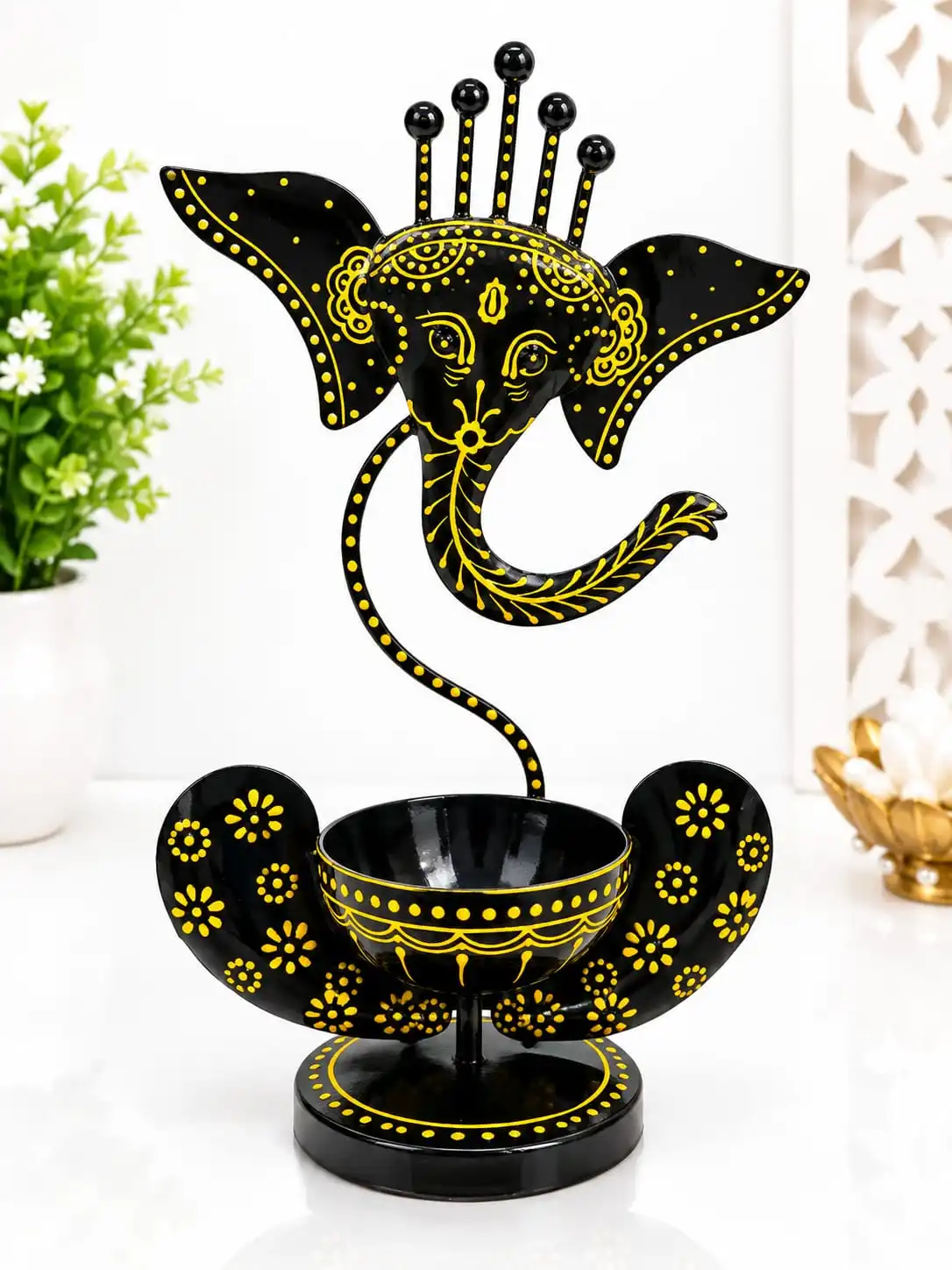 Handcrafted Ganesha-Inspired Decorative Showpiece with a unique artistic design.