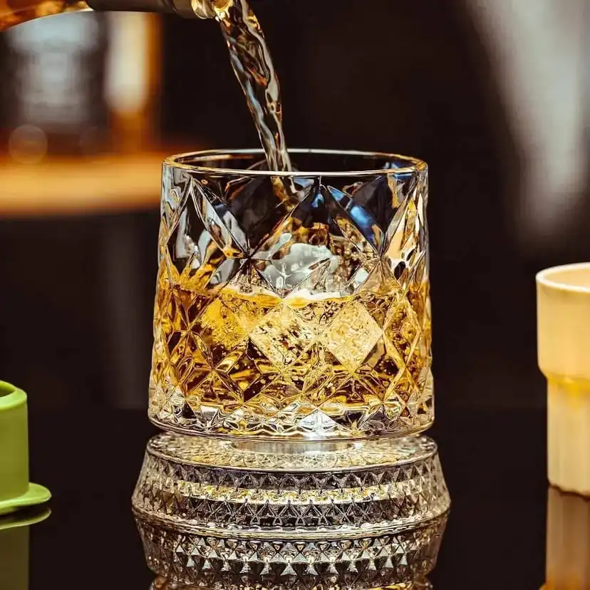 Intricate Crystal-Cut Design: Features a detailed geometric diamond pattern across the glass surface 360° Rotating Feature.